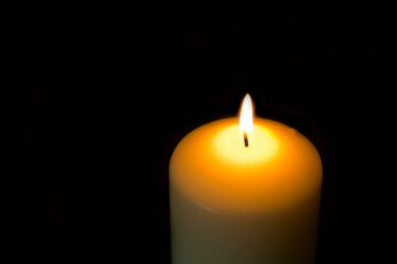 candles that are lit in the dark