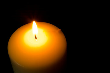 candles that are lit in the dark