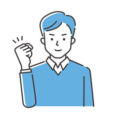 ガッツポーズの若い男性