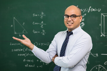 Young asian teacher man teaching video conference with student. Male Indian teacher training the...