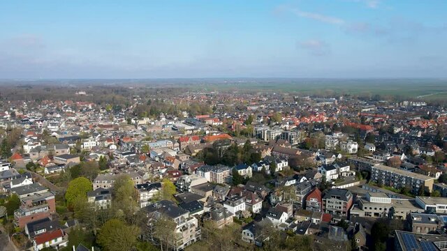 Jib down of beautiful small town on a bright, sunny day