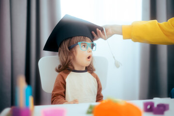 Funny Toddler Girl Wearing Graduation Cap and Eyeglasses