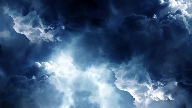 a thunderstorm inside the thick clouds moving in the sky.