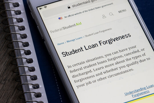 Portland, OR, USA - Apr 21, 2021: The Student Loan Forgiveness page is seen on the website of the U.S. Department of Education's Federal Student Aid from an iPhone.