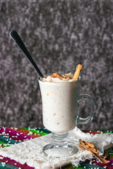 Rice pudding and cinnamon, Mexican dessert, different backgrounds, frontal and overhead	