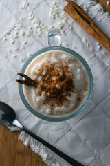 Rice pudding and cinnamon, Mexican dessert, different backgrounds, frontal and overhead	