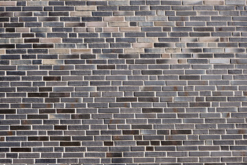 Background from a new gray brick wall