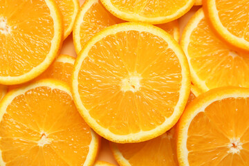 Pieces of fresh oranges as background