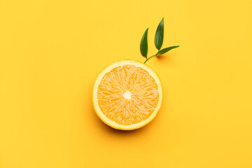 Piece of fresh orange fruit on color background