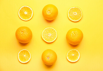 Fresh oranges on color background