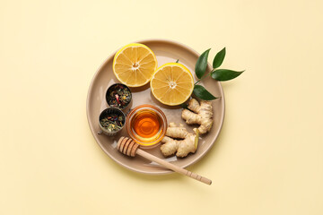 Composition with ingredients for tasty ginger tea on color background