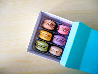 Colorful macarons in a gift box,Traditional french dessert.