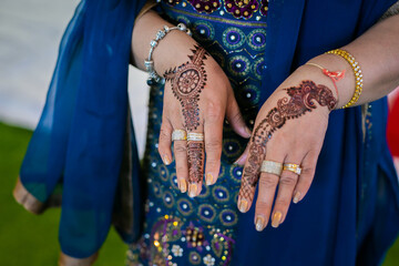Fototapeta na wymiar Indian bride's wedding henna mehendi mehndi hands close up