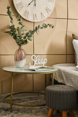 Bedside table in interior of room