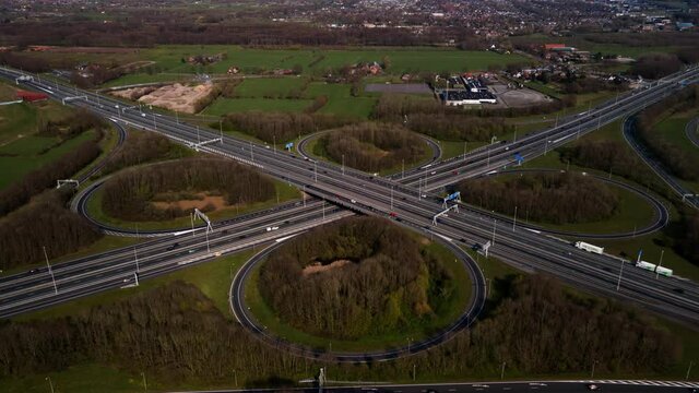 Knooppunt Hoevelaken in the shape of a clover aerial drone view. Intersection of the A28 and A1 highway The Netherlands.