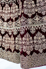Indian Punjabi bride's wedding outfit pattern, fabric close up