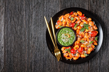 Cherry tomato gnocchi with mint pesto, copy space