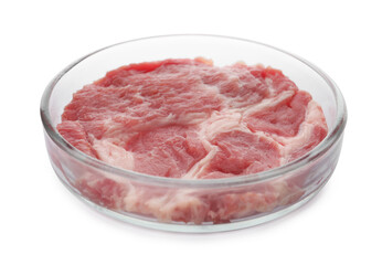 Petri dish with piece of raw cultured meat on white background