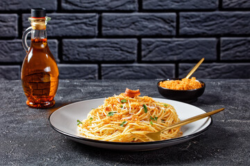 Pasta mollicata with anchovies, top view, close-up