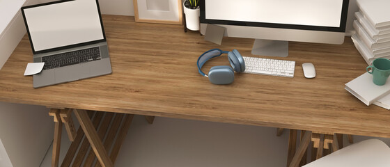 3D rendering, wooden computer desk with laptop, headphone, supplies and decorations in home office...