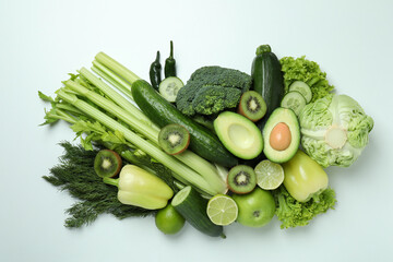 Fresh green vegetables on white background, top view