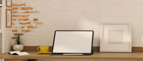 Obraz premium 3D rendering, portable workspace with digital tablet, accessories, cup and decorations on wooden desk