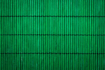 Bamboo background image. Green colored thin bamboo sticks.