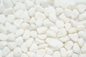 surface of Clean white pebbles for background.