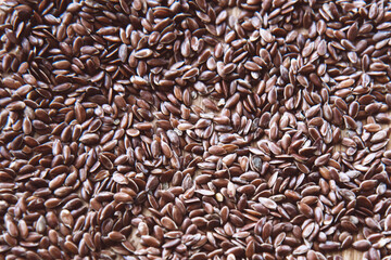 Flax seeds texture background. Abstract food background. Top view