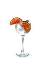 Glass of cocktail with grapefruit isolated on white background