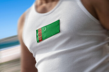 The national flag of Turkmenistan on the athlete's chest