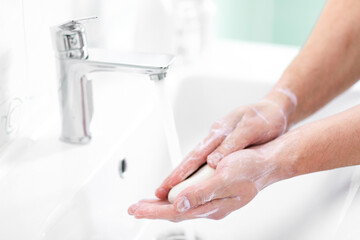 thorough hand washing with soap and water to prevent coronavirus - Image