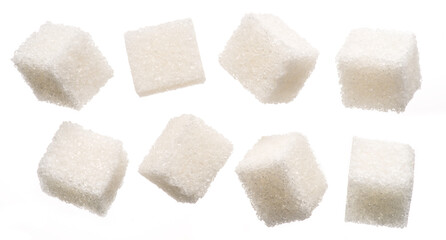 White sugar cubes on white background. Macro picture.