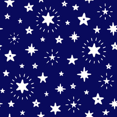 Doodle starry night sky vector seamless pattern. White silhouettes on a dark blue background. Hand Drawn endless magic print with stars.