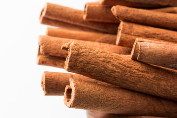 Cinnamon sticks isolated on white. stock photo