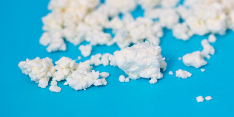 Milk curd on a blue background.