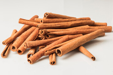 Cinnamon sticks isolated on white. stock photo