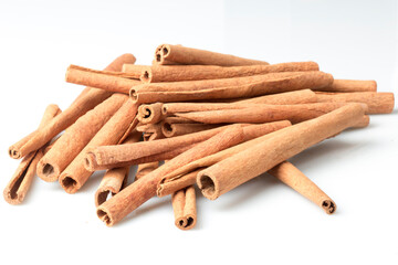 Cinnamon sticks isolated on white. stock photo