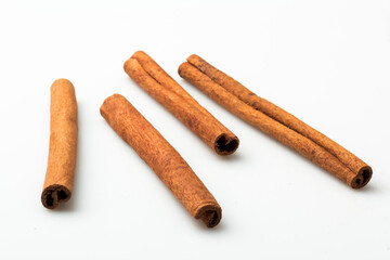 Cinnamon sticks isolated on white. stock photo
