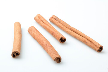 Cinnamon sticks isolated on white. stock photo