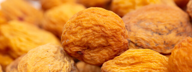 Dried apricots as an abstract background.