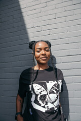 Portrait of a young woman with braids