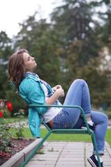 Portrait of a young beautiful girl in the park