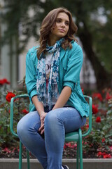 Portrait of a young beautiful girl in the park