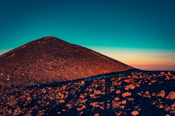 The top crater of Mt Etna (Crateri Sommitali) at sunset. Warm light, teal sky. 