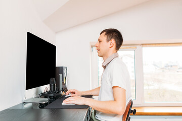 male bloggers recording video blog or music vlog at home. Blogging, music, creation.