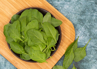 Fresh Spinach in bowl stock photo