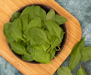 Fresh Spinach in bowl stock photo
