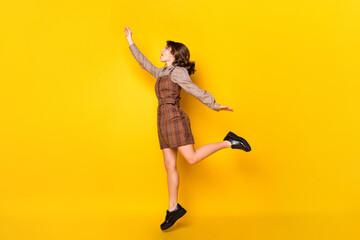Full size profile photo of optimistic funny brunette lady jump arm wear shirt dress sneakers...