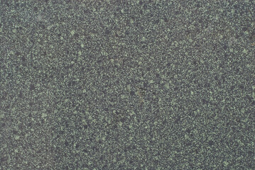 Texture of black and green marble. Stone tile with natural pattern. Marble pavement closeup.